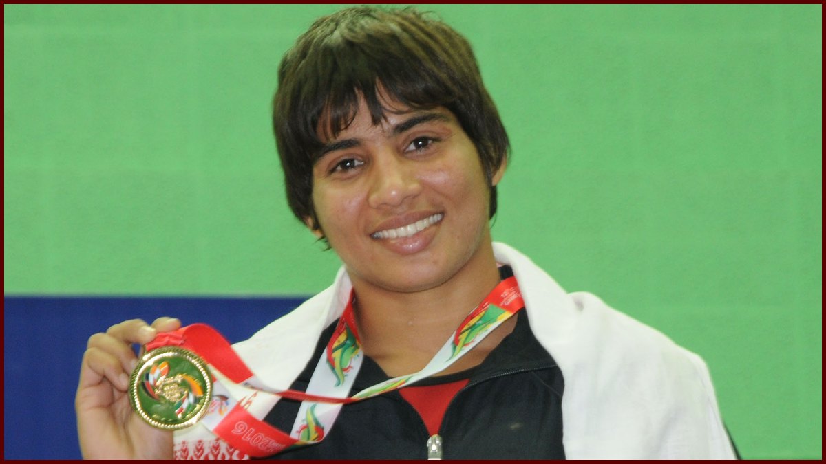 Manisha Bhanwala holding a gold medal at the 2016 South Asian Games in Guwahati (Government of India photo); not a photo from Astana